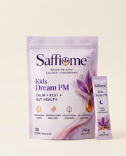 Kids Dream PM pouch, 30 honey sachets, with one sachet leaning on it